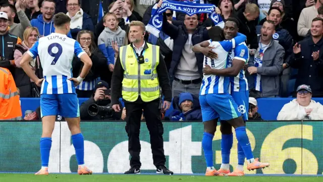 Brighton players celebrate a goal