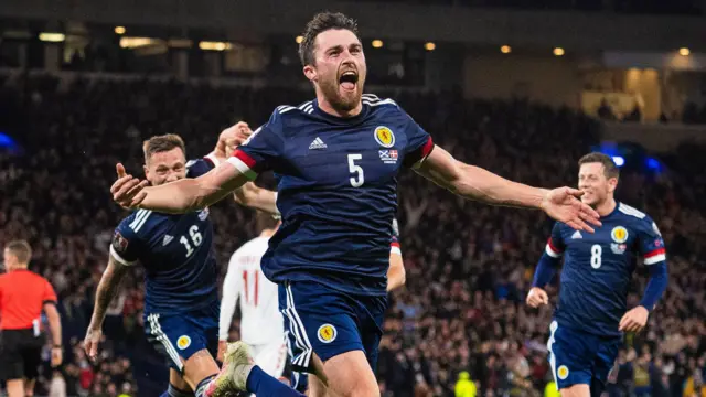 John Souttar celebrates scoring for Scotland against Denmark at Hampden Park