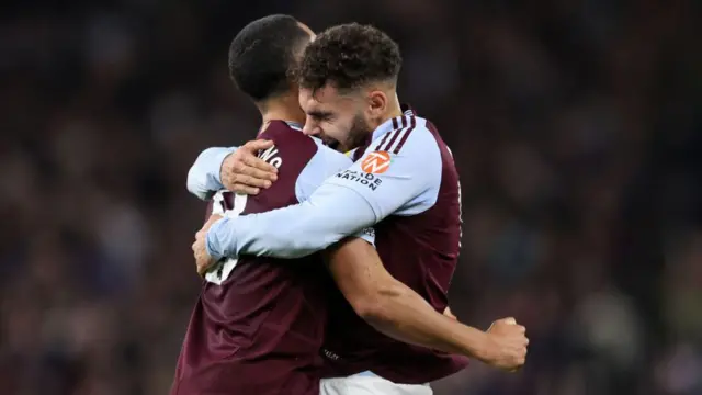 Andres Garcia embraces Aston Villa teammate Youri Tielemans