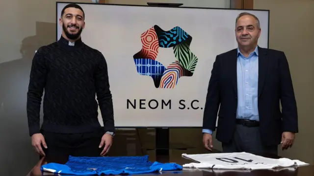 Said Benrahma at his unveiling at Neom alongside Kyriakos Dourekas 