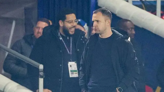 Birmingham City head coach Chris Davies stood on the touch line.