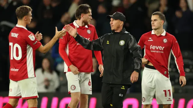 Gerhard Struber greets his Bristol City players after the draw at Derby County