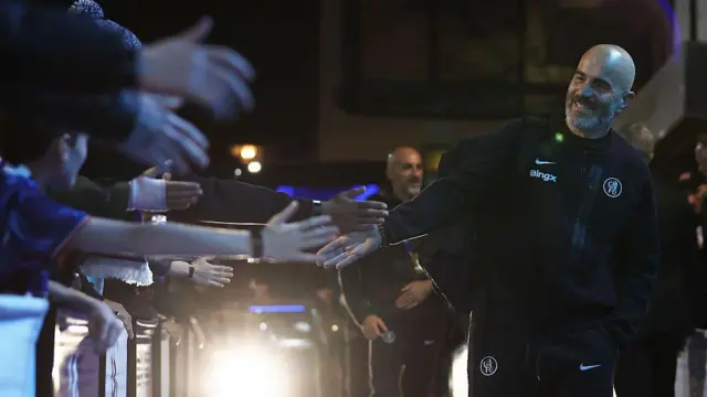 Enzo Maresca interacts with the fans as he arrives at Stamford Bridge prior to the Champions League League Phase match between Chelsea and Ajax