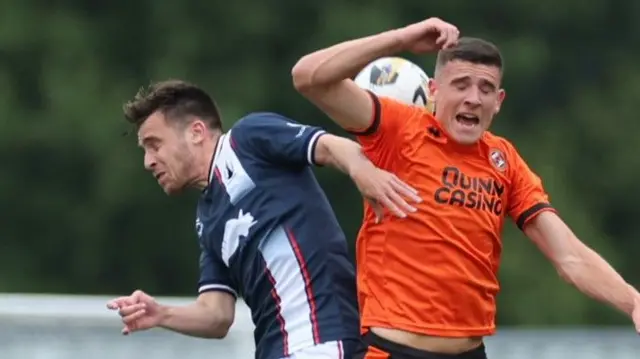 Falkirk's Ross MacIver and Dundee United's Ross Graham