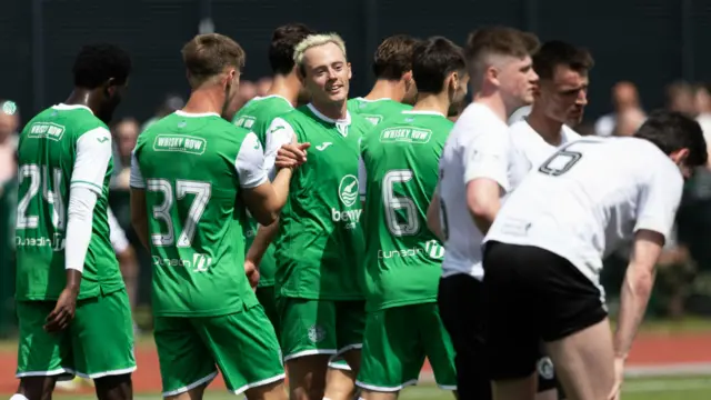 Hibs forward Harry McKirdy, centre, celebrates his superb goal