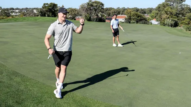 Josh van der Flier celebrates a successful putt 