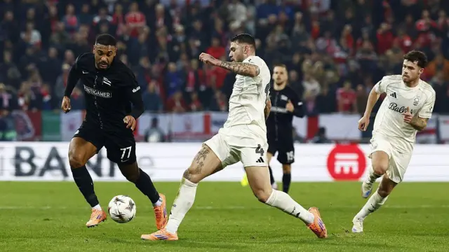 Nottingham Forest defender Morato runs with the ball