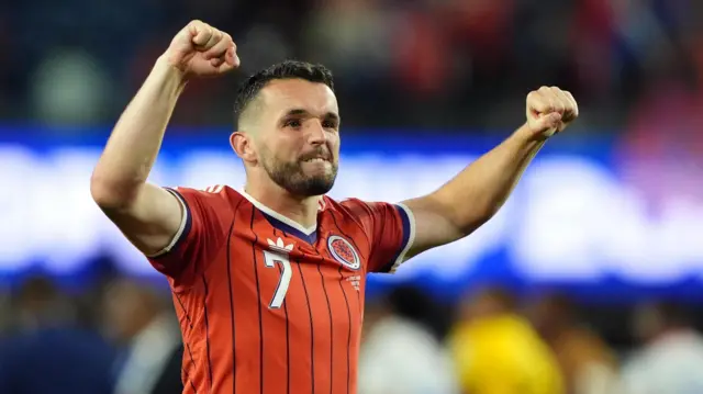 Scotland's John McGinn celebrates following the FIFA World Cup Group C match at the Boston Stadium, Foxborough.