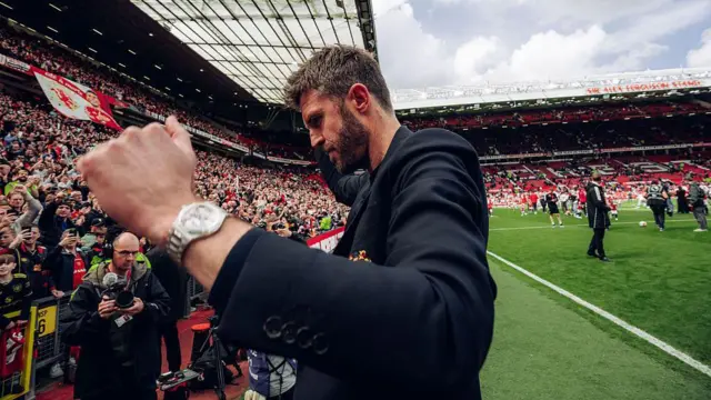 Michael Carrick walks off the Old Trafford pitch after the Premier League match between Manchester United and Nottingham Forest
