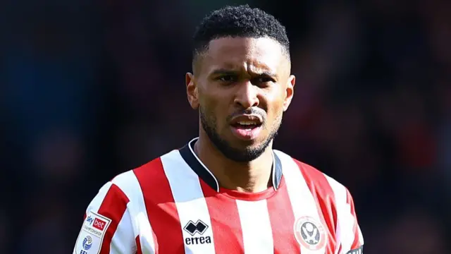 Tyrese Campbell in a red and white shirt of Sheffield United