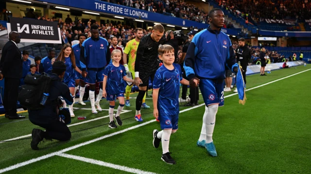 Moises Caicedo leads Chelsea out of the tunnel for the Conference League play-off game with Servette at Stamford Bridge