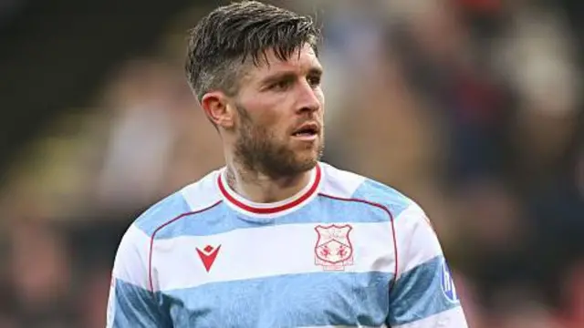 Josh Windass keeps calm after scoring for Wrexham