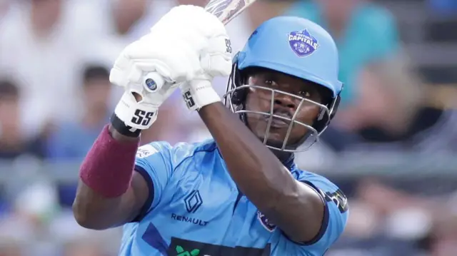 Sherfane Rutherford of Pretoria Capitals hits a six