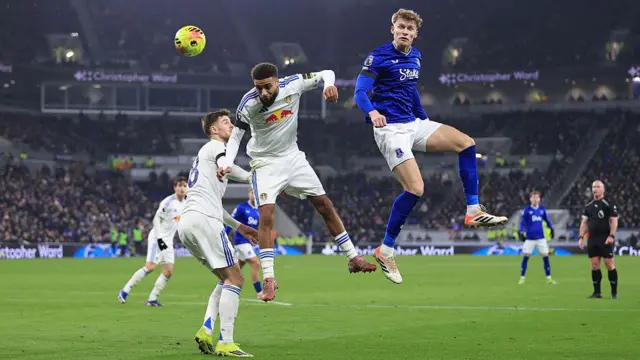 Jayden Bogle of Leeds United challenges for an aerial ball with Jarrad Branthwaite