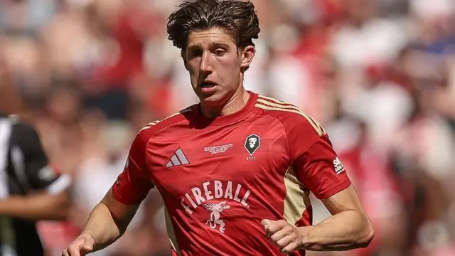 Josh Austerfield in action for Salford City in last season's League Two play-off final
