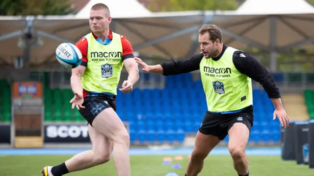 Mann (left) in training with Scotland international Allan Dell