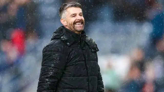 Stephen Robinson celebrates St Mirren's win over Falkirk