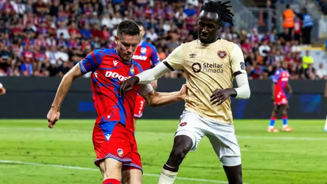 Hearts Malachi Boateng and Viktoria Plzen's Lukas Kalvach in action during a UEFA Europa League play-off match between FC Viktoria Plzen and Heart of Midlothian at the Doosan Arena