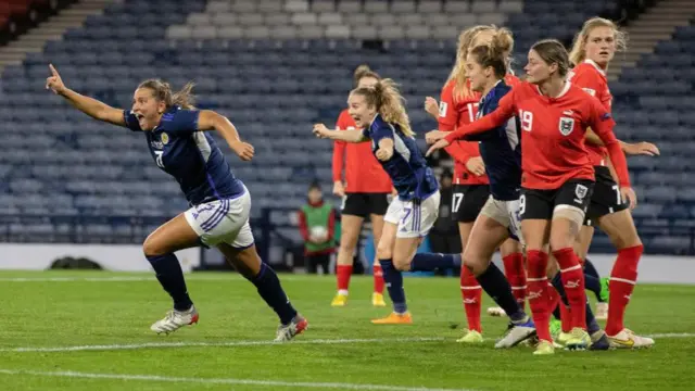 Scotland's Abi Harrison celebrates after making it 1-0 during a FIFA Women's World Cup playoff match between Scotland and Austria at Hampden Park