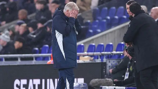 David Moyes with his head in his hands