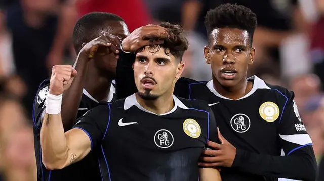 Moises Caicedo and Estevao Willian celebrate with Pedro Neto after his goal against West Ham