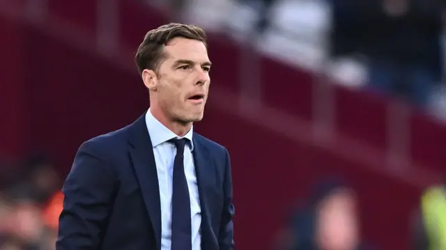 Scott Parker looks on from touchline