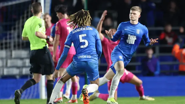 Jordan James and Dion Sanderson celebrate late goal