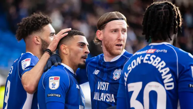 Cardiff players celebrate Karlan Grant's goal against Stoke