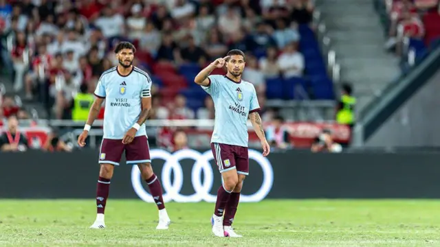 Joao Gomes of Aston Villa FC (R) celebrates after scoring his goal