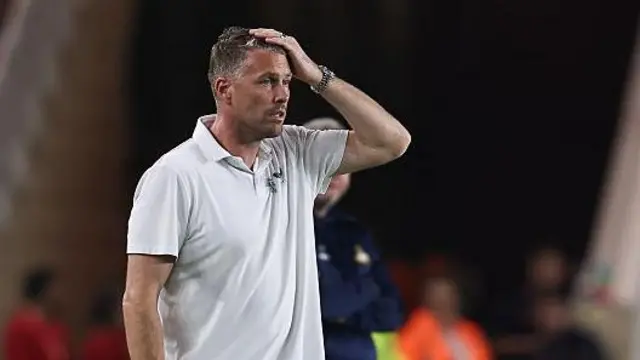 Boro boss Rob Edwards with head in hand as his side are beaten by Doncaster