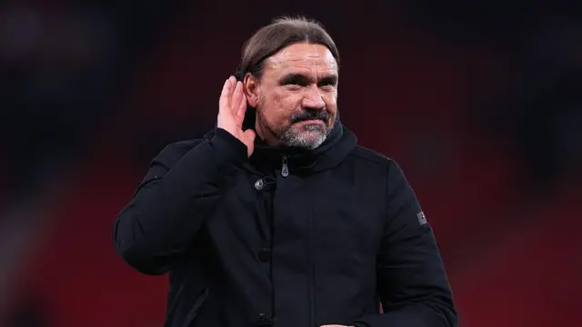 Daniel Farke gestures to supporters