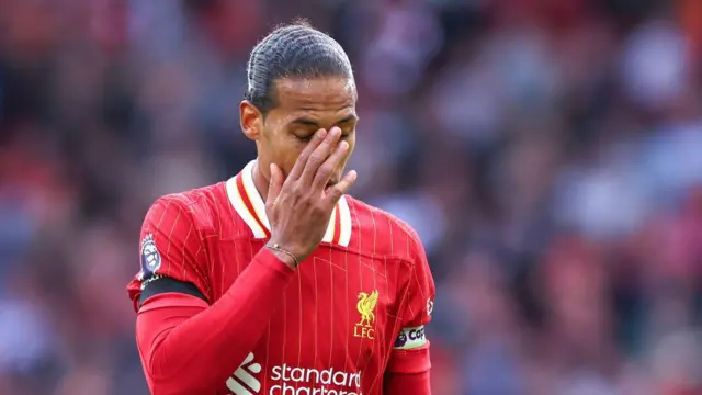 Virgil van Dijk looks dejected during Liverpool's defeat by Nottingham Forest at Anfield