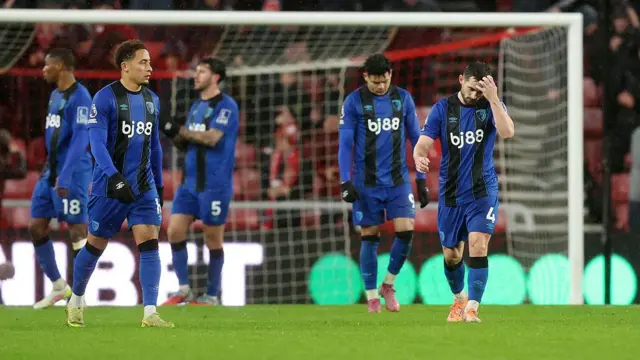 Bournemouth players look dejected after conceding a goal