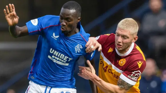 Rangers' Mohamed Diomande and Motherwell's Liam Gordon