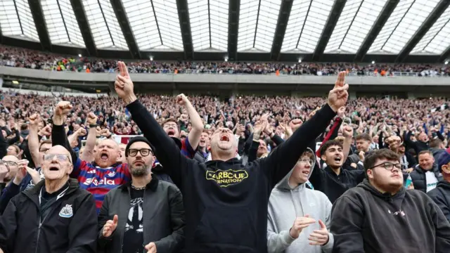 Fans celebrating at St. James' Park