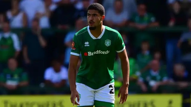 Raphael Araoye standing on the pitch during a game for Yeovil