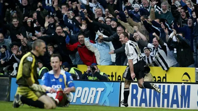 Alan Shearer of Newcastle celebrates scoring his record breaking goal