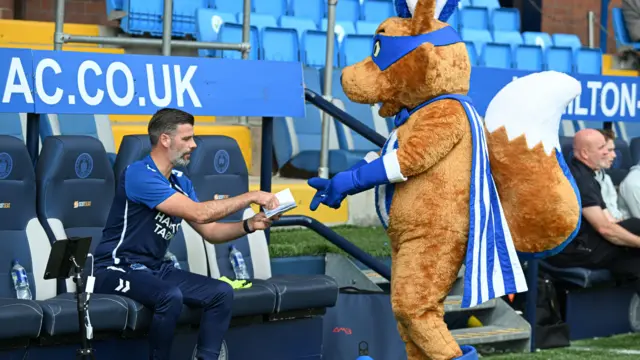 Stuart Kettlewell asks Captain Conker for his autograph