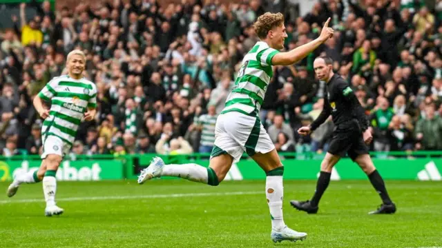 Arne Engels celebrates after scoring for Celtic against Hearts