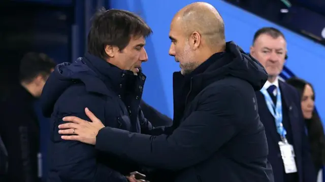 Antonio Conte and Pep Guardiola shake hands