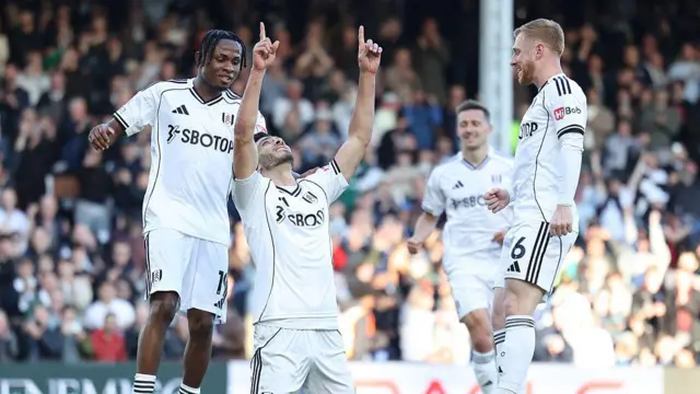 Raul Jimenez celebrates with his teammates