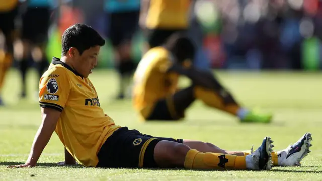 Hwang Hee-Chan looks dejected