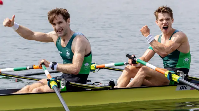 Paul O'Donovan (left) and Fintan McCarthy celebrate after retaining their rowing lightweight double sculls title 