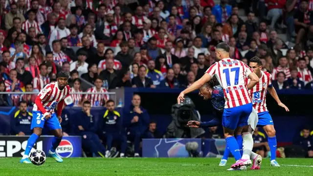 Eberechi Eze is challenged by David Hancko