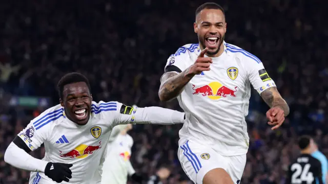 Lukas Nmecha of Leeds United celebrates scoring his team's first goal with teammates 