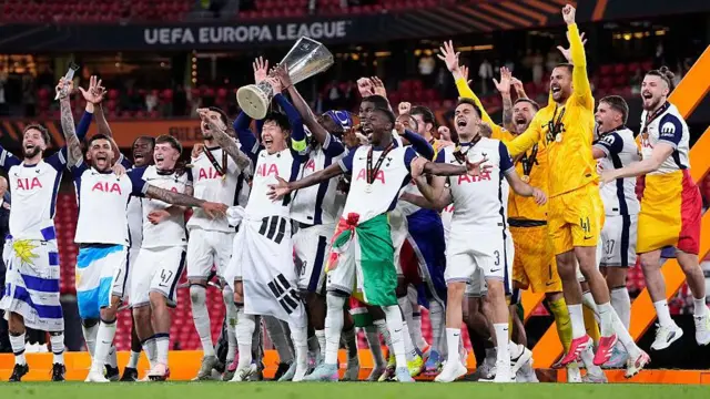 Tottenham players lift Europa League trophy