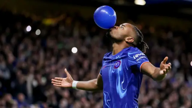 Christopher Nkunku celebrates goal with balloon