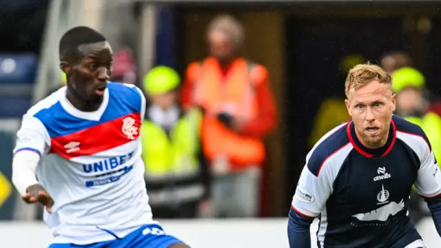 Rangers' Mohamed Diomande and Falkirk's Scott Arfield