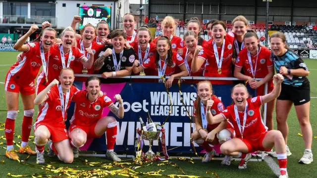 Cliftonville celebrate with the League Cup