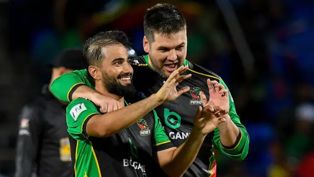 Waqar Salamkheil (L) and Rilee Rossouw (R) of Saint Kitts and Nevis Patriots celebrate the dismissal of Odean Smith of Antigua and Barbuda Falcons during the Men's 2025 Republic Bank Caribbean Premier League